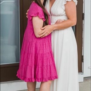 Pink polka dotted dress with ruffles